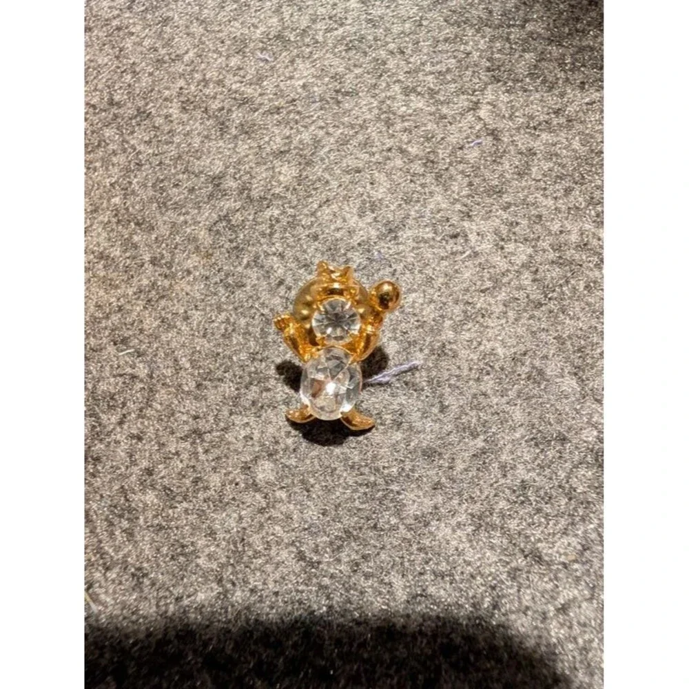 Gold and CZ clown pen or Thai tech?